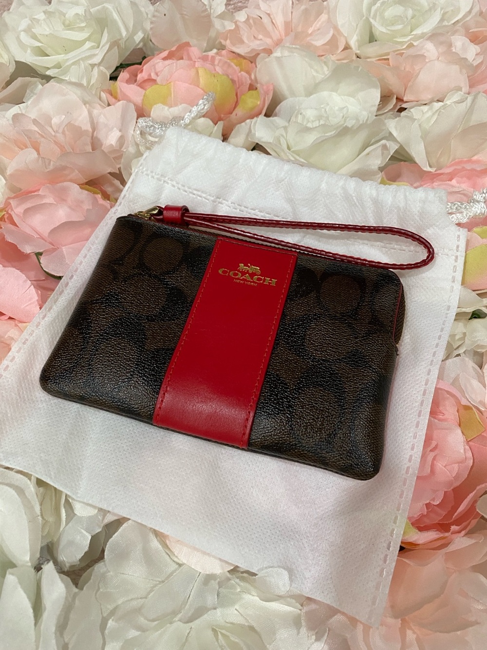 COACH Brown Signature Monogram Wristlet